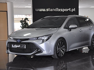 Toyota Corolla 1.8 Hybrid Comfort+P.Sport com 56 098 km por 27 990 € Stand LX Sport | Lisboa