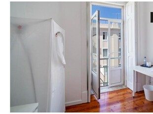 Aluga-se quarto em apartamento de 6 quartos em Santa Cruz, Lisboa